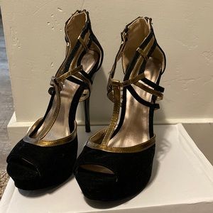 Size 7 Gold and black Charlotte Russe heels